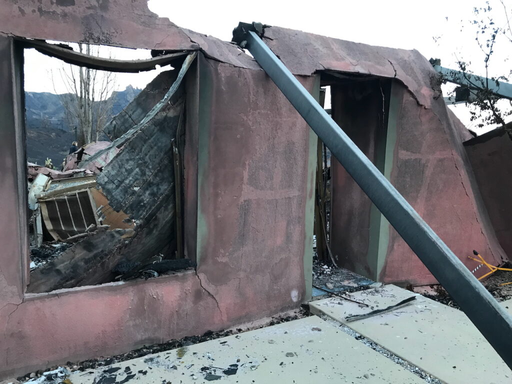 Exterior wall of home destroyed by wildfire