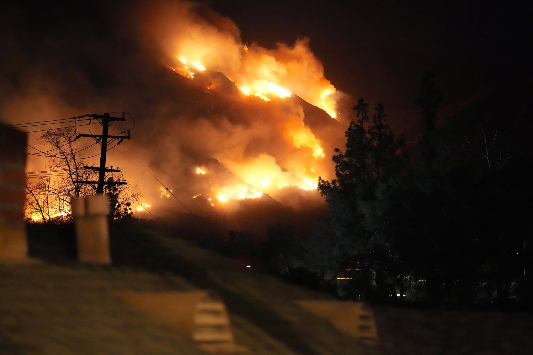 Wildfire burning in the Santa Monica Mountains during extreme fire weather conditions.