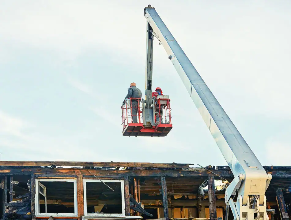 Community-scale rebuilding after a fire.