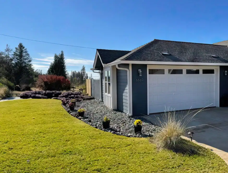 A photo of a home updated to reduce the risk of wildfire ember ignition.