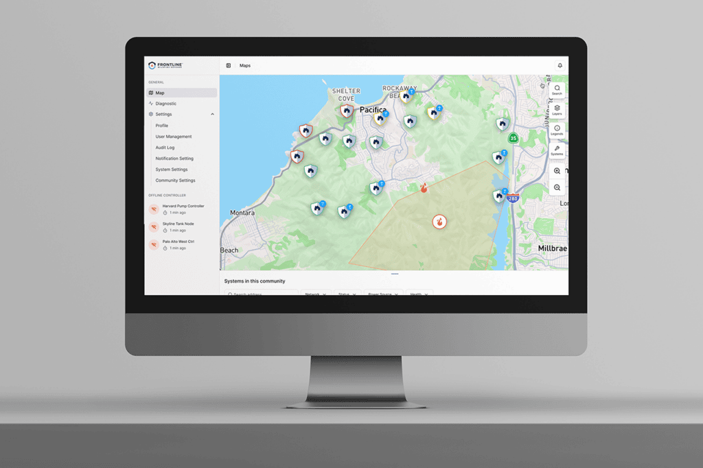 A photo of a desktop monitor showing the Frontline commercial wildfire defense system user interface for clients maintaining commercial real estate and businesses.
