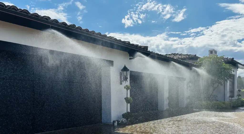 The Frontline system actively spraying a mixture of water and Class-A foam, illustrating the system's zone cycling and low-volume foam adhesion features.